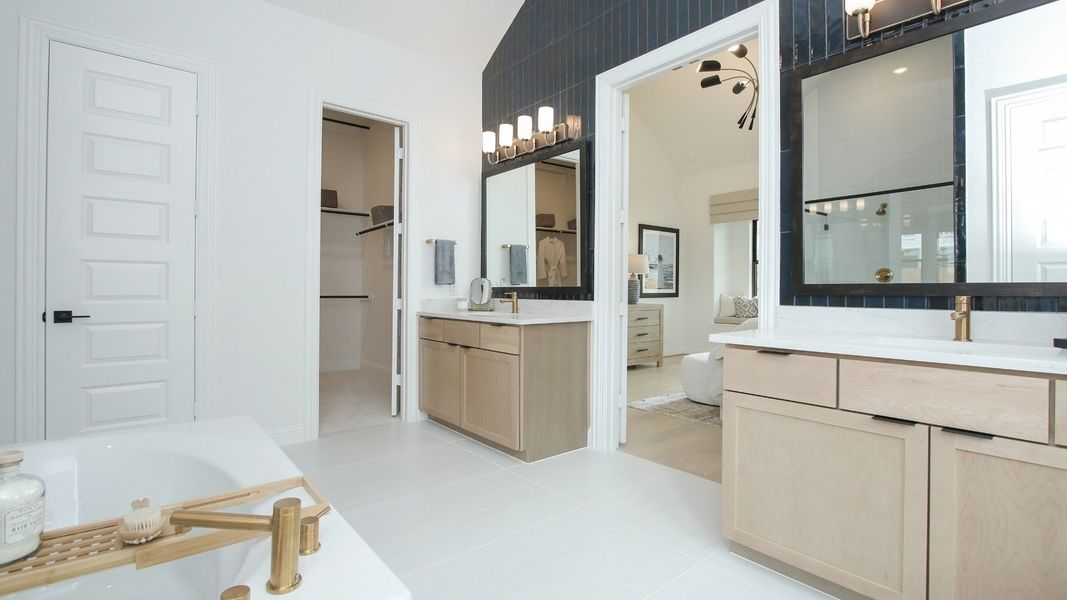 Representative furnished interior of a home built from the Willow by Brightland Homes in Sunterra, Katy (Image 11).