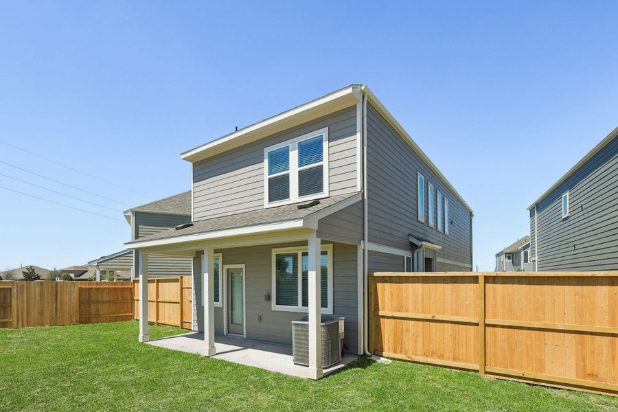 Exterior details and patio area of a home in Parkway Commons - City Series, Missouri City (Image 4).