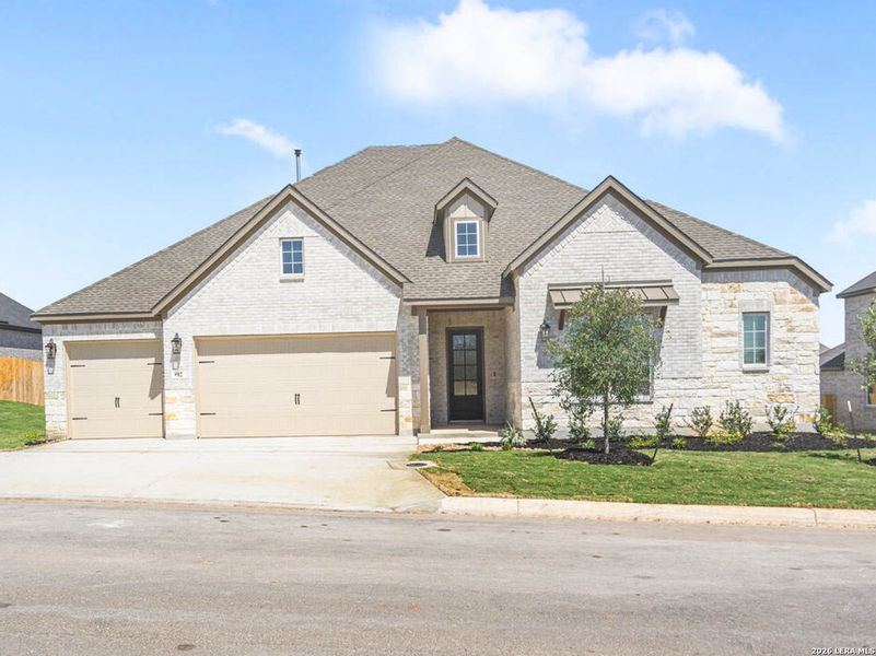 Front exterior of a new home in Potranco West, Castroville, TX, highlighting curb appeal (Image 1). Front exterior of a new home in Potranco West, Castroville, TX, highlighting curb appeal (Image 1).