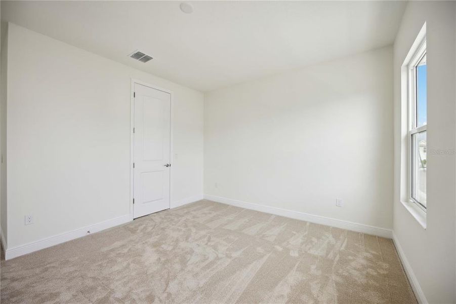Spacious, unfurnished interior of a new home in Bungalow Walk at Lakewood Ranch, Lakewood Ranch (Image 22).