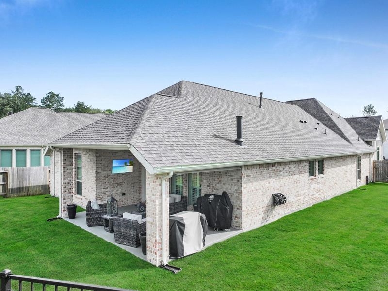 Exterior details and patio area of a home in Artavia, Conroe (Image 4).