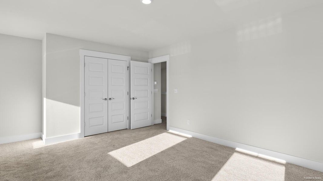 Spacious, unfurnished interior of a new home in The Haven at Indigo Preserve, Leland (Image 48).