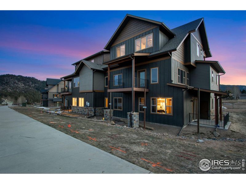 Front exterior of a new home in , Estes Park, CO, highlighting curb appeal (Image 19).