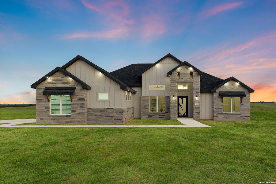 Front exterior of a new home in , La Vernia, TX, highlighting curb appeal (Image 23). Front exterior of a new home in , La Vernia, TX, highlighting curb appeal (Image 23).