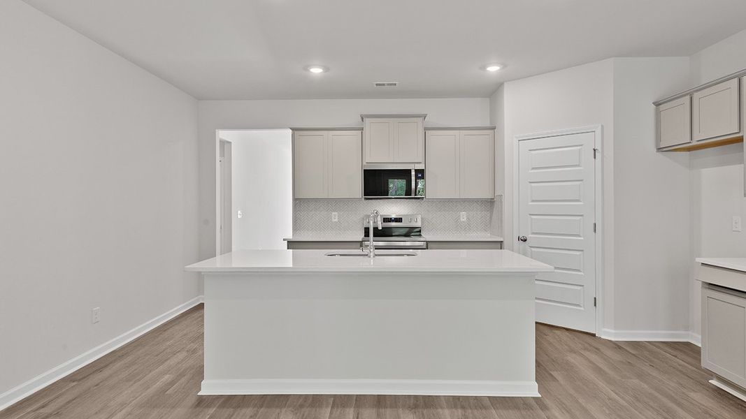Representative furnished interior of a home built from the Celia by D.R. Horton in Teamon Pointe, Griffin (Image 4).