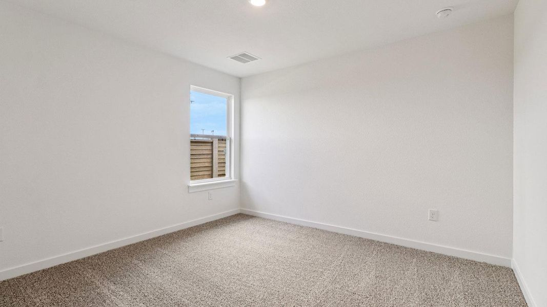 Spacious, unfurnished interior of a new home in Monarch Ranch, Manor (Image 12).