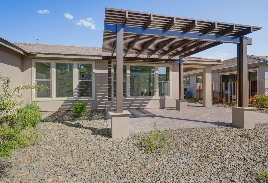 Rear Exterior with Covered Patio - 24 of 27