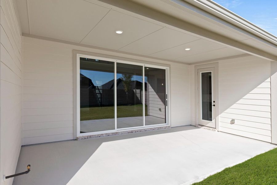 Exterior details and patio area of a home in Inspiration Collection 60 at Painted Tree, McKinney (Image 3). Exterior details and patio area of a home in Inspiration Collection 60 at Painted Tree, McKinney (Image 3).