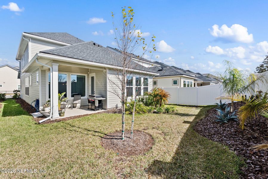 Exterior details and patio area of a home in Granville at eTown 38', Jacksonville (Image 27).