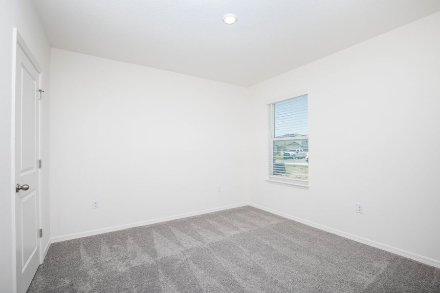 Representative unfurnished interior of a home built from the Springfield by Maronda Homes in Hontoon Reserve, Deland (Image 9).