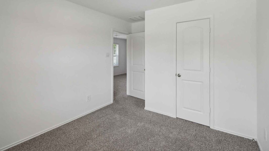 Spacious, unfurnished interior of a new home in Grand Pines, Magnolia (Image 23).