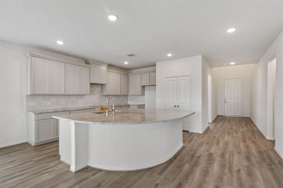 Furnished interior view inside a new home in Aldeana, Bonney (Image 9).