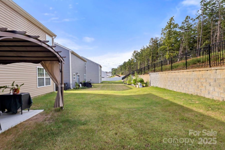 Front exterior of a new home in Mills at Long Creek, Dallas, NC, highlighting curb appeal (Image 1).