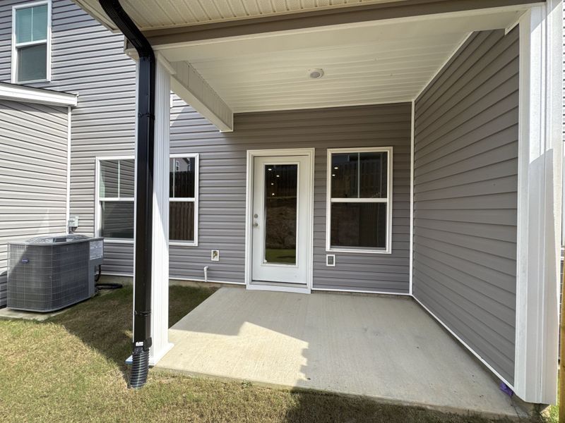 Exterior details and patio area of a home in Caroleton Townhomes, Grovetown (Image 3). Exterior details and patio area of a home in Caroleton Townhomes, Grovetown (Image 3).