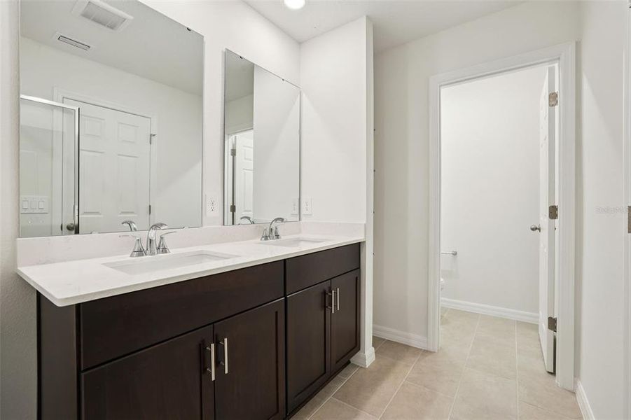 Furnished interior view inside a new home in Cagan Crossings West, Clermont (Image 13).