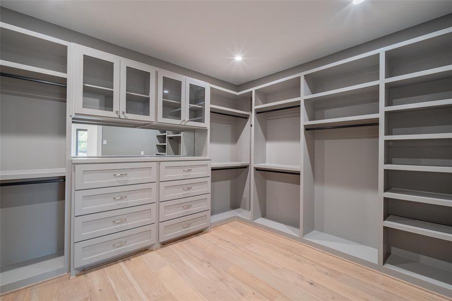 Walk in closet featuring light hardwood / wood-style floors