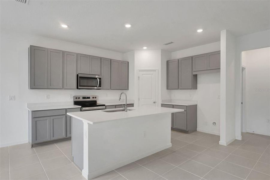 Furnished interior view inside a new home in Annabelle Estates, Winter Haven (Image 7).