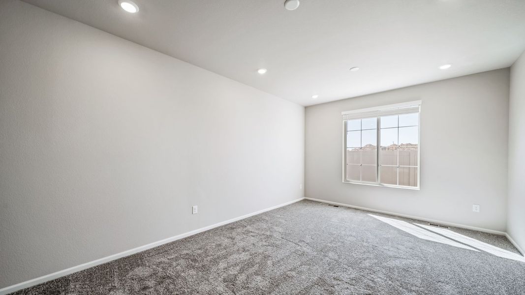 Spacious, unfurnished interior of a new home in The Reserve at Green Valley Ranch, Aurora (Image 13).