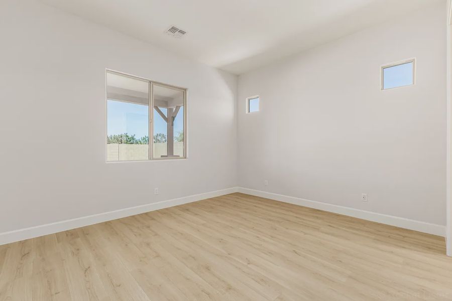 Spacious, unfurnished interior of a new home in Bellero Estates, Queen Creek (Image 21).