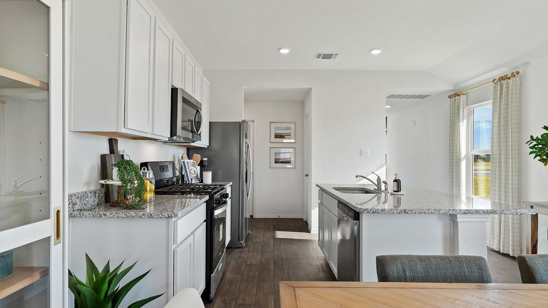 Furnished interior view inside a new home in Watermill, Kyle (Image 7).