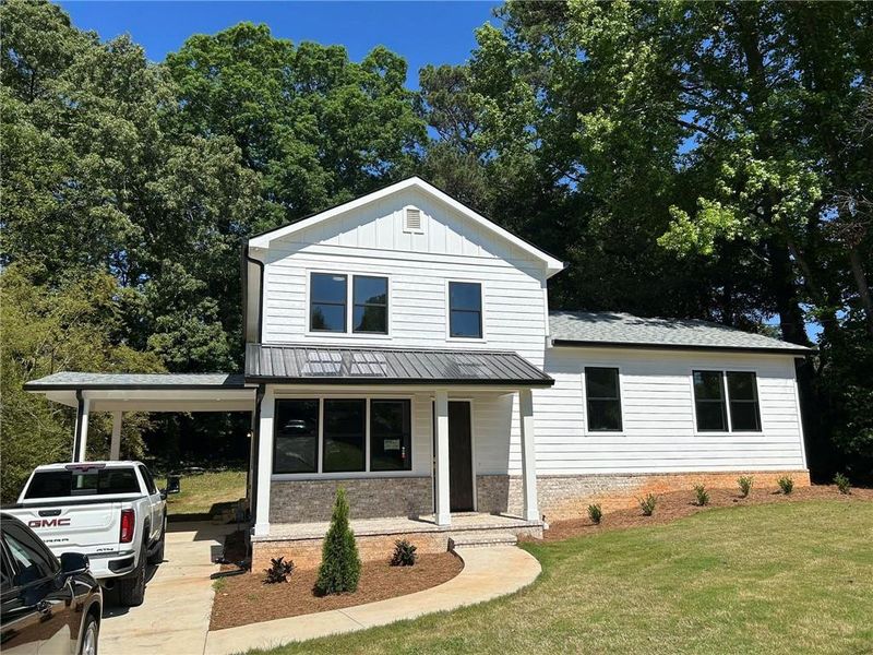 Front exterior of a new home in , Marietta, GA, highlighting curb appeal (Image 2). Front exterior of a new home in , Marietta, GA, highlighting curb appeal (Image 2).