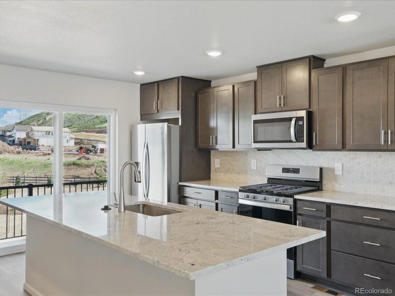 Furnished interior view inside a new home in Three Hills, Morrison (Image 10).