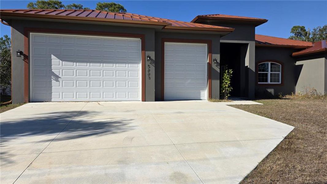 Front exterior of a new home in , North Port, FL, highlighting curb appeal (Image 30).