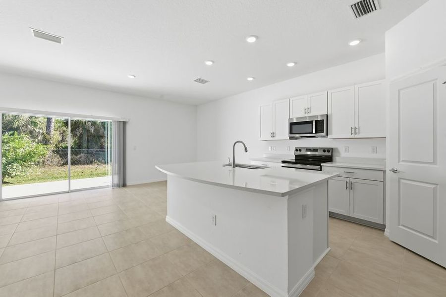 Furnished interior view inside a new home in Vinterra Townhomes, Nokomis (Image 5).