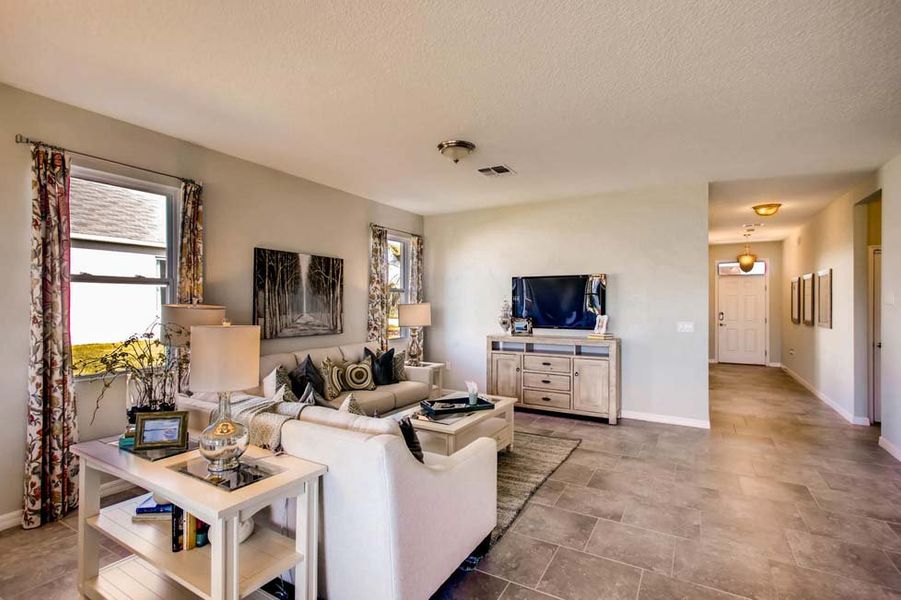 Furnished interior in a model home at Preserves at Lakeside Landings in Winter Haven (Image 20).