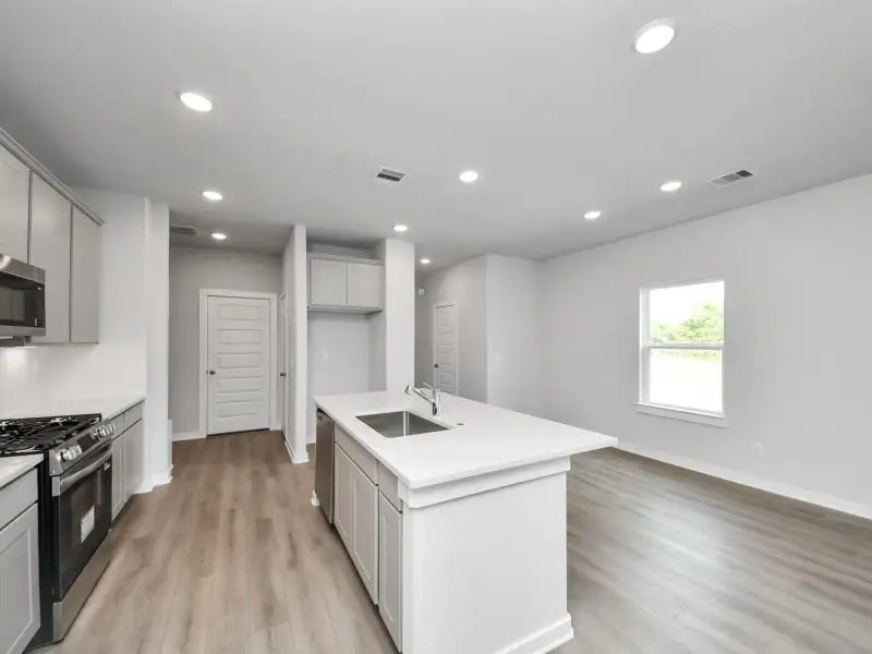 Furnished interior view inside a new home in Windmill Estates, Magnolia (Image 5).