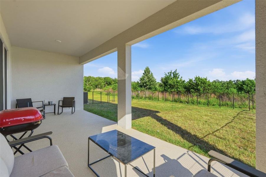 Exterior details and patio area of a home in Silverstone North, Palmetto (Image 28).
