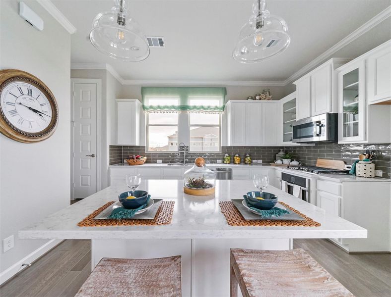 Stunning island kitchen (*Photo not of actual home and used for illustration purposes only.)