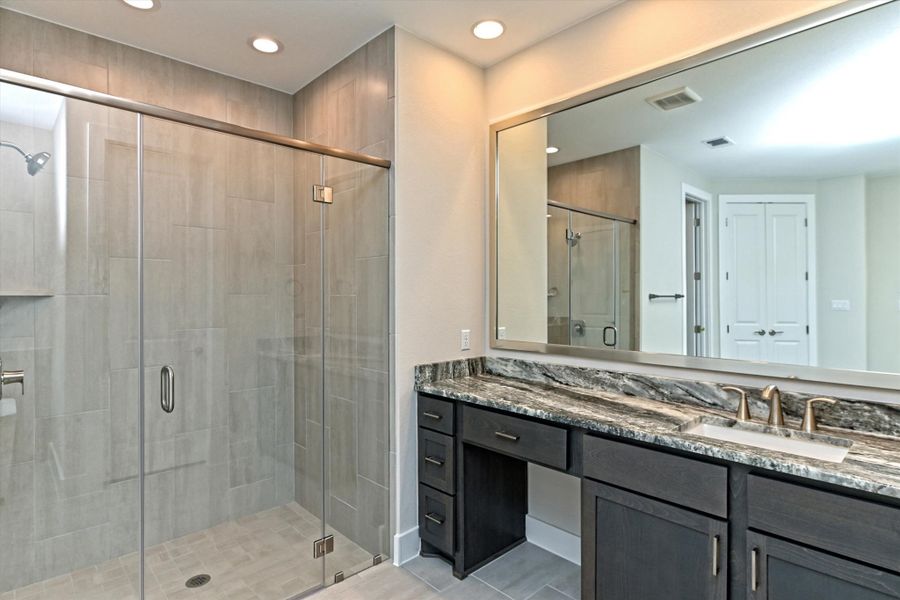 Representative furnished interior of a home built from the Opal by Giddens Homes in Riverstone, Georgetown (Image 12).