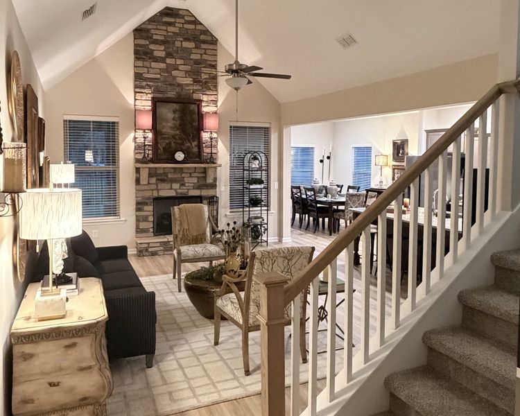 STOCK PHOTO: This home will have a similar looking Gas Fireplace w/ Stone!