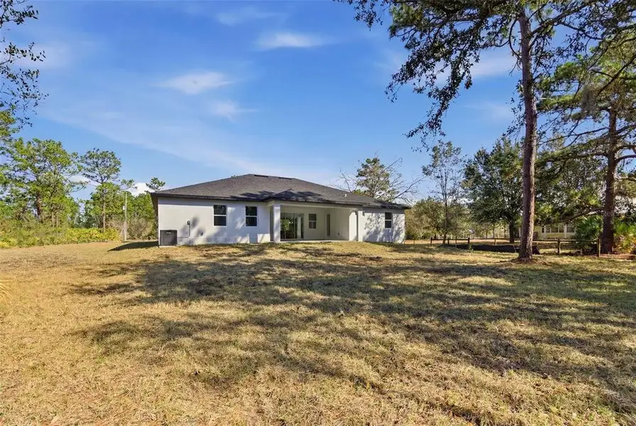 Exterior details and patio area of a home in , Orlando (Image 25).