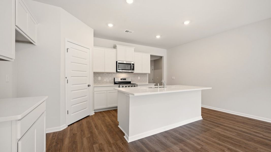 Furnished interior view inside a new home in The Reserve at Calcutta, Stockbridge (Image 8).