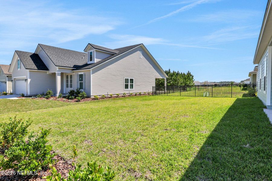 Exterior details and patio area of a home in Hyland Trail, Green Cove Springs (Image 30).