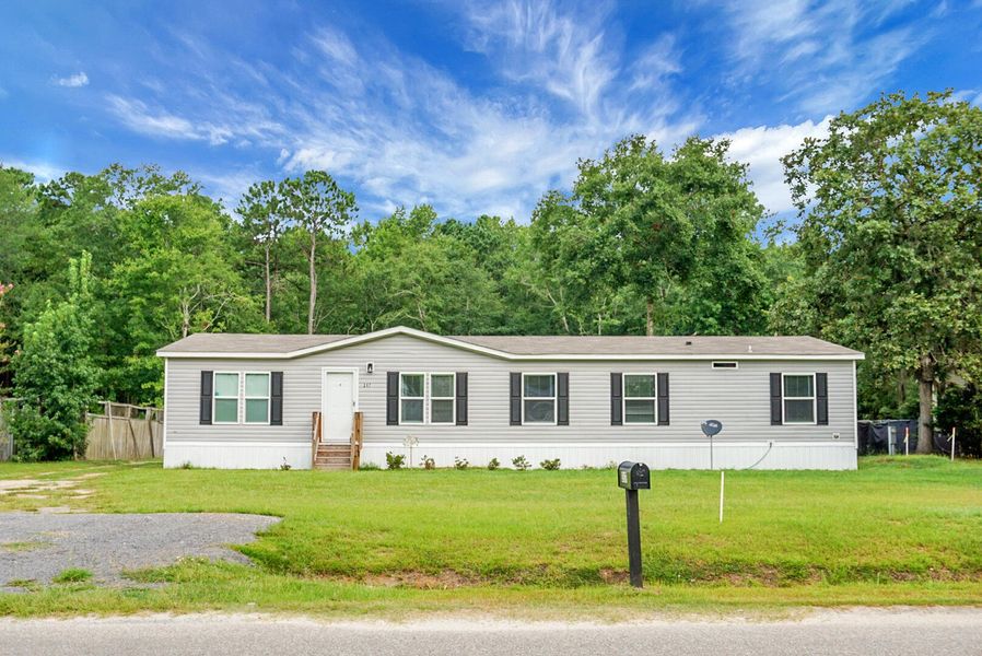 Front exterior of a new home in , Bonneau, SC, highlighting curb appeal (Image 30).
