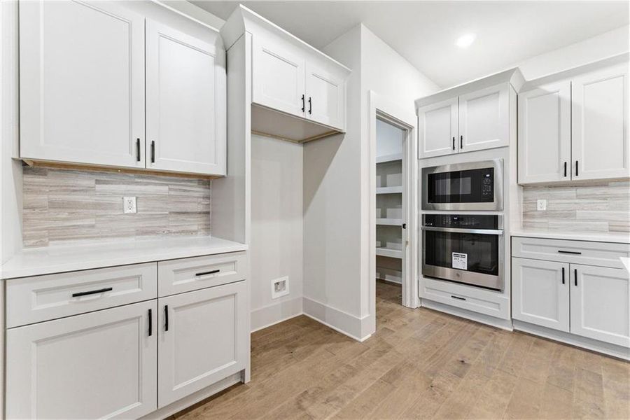 Furnished interior view inside a new home in Steeplechase, Hoschton (Image 9).