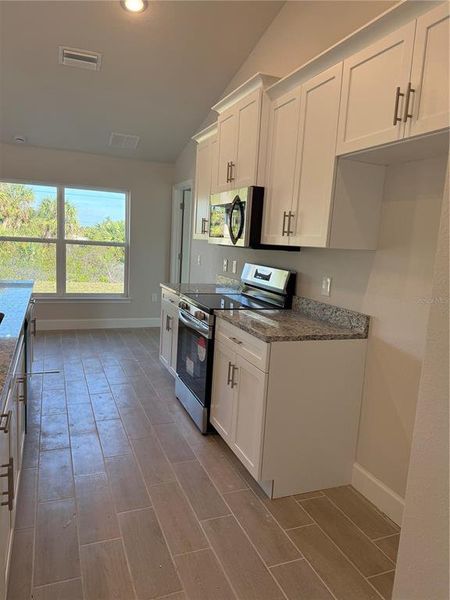 Furnished interior view inside a new home in South Gulf Cove, Port Charlotte (Image 7).
