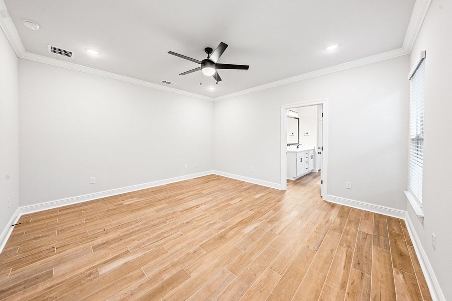 Spacious, unfurnished interior of a new home in Bird Song at Hammock Bay, Freeport (Image 20).