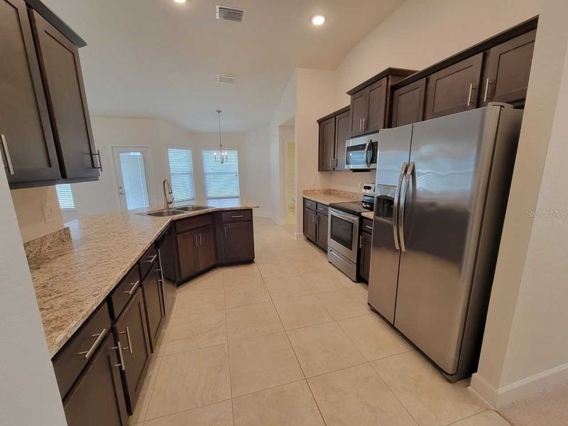 Furnished interior view inside a new home in Ocala Crossings South, Ocala (Image 6).