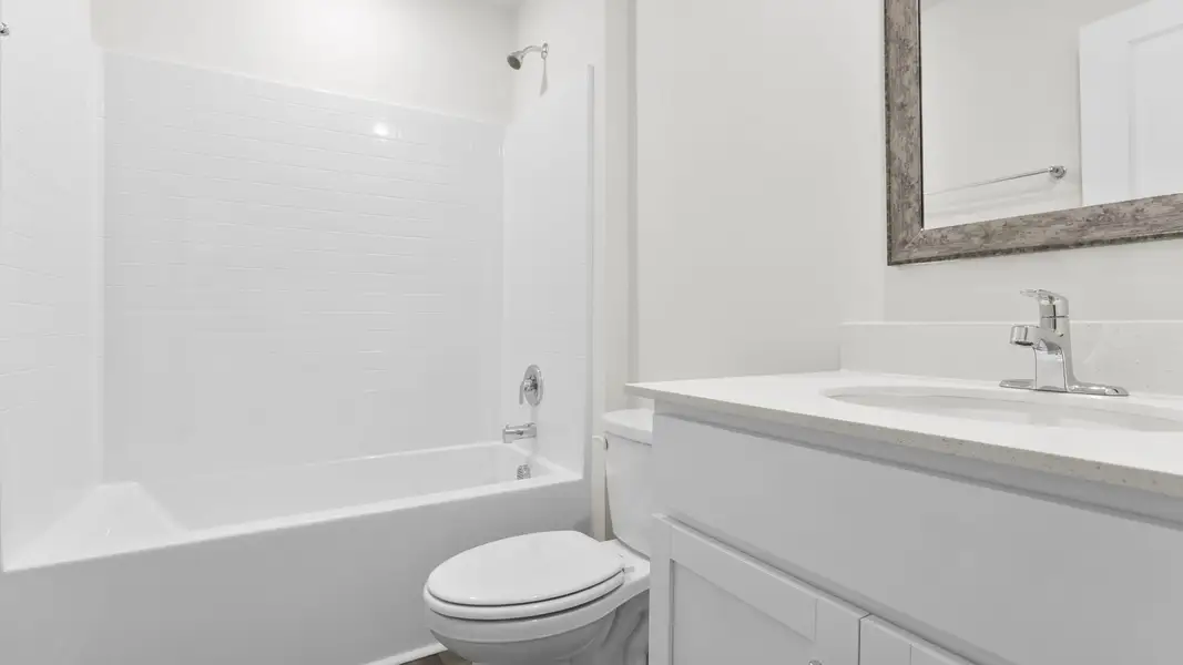 Furnished interior view inside a new home in Village Grove, Greenville (Image 6).