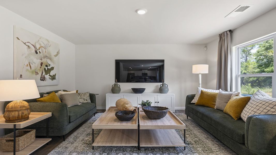 Furnished interior view inside a new home in Bentley Park, Greenwood (Image 11).