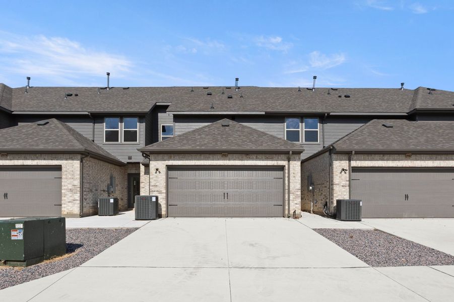 Front exterior of a new home in Timber Ridge, Corinth, TX, highlighting curb appeal (Image 27).
