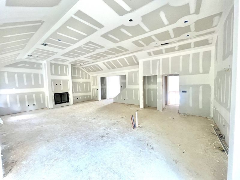 Looking back towards from of the house showing foyer with hardwood stairs