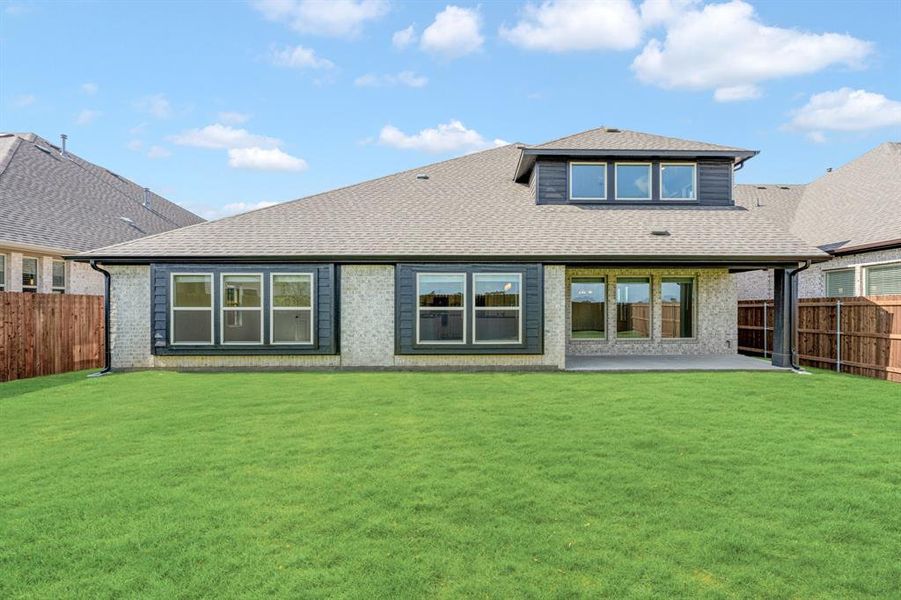 Exterior details and patio area of a home in Wildflower Ranch 60-65, Justin (Image 4). Exterior details and patio area of a home in Wildflower Ranch 60-65, Justin (Image 4).
