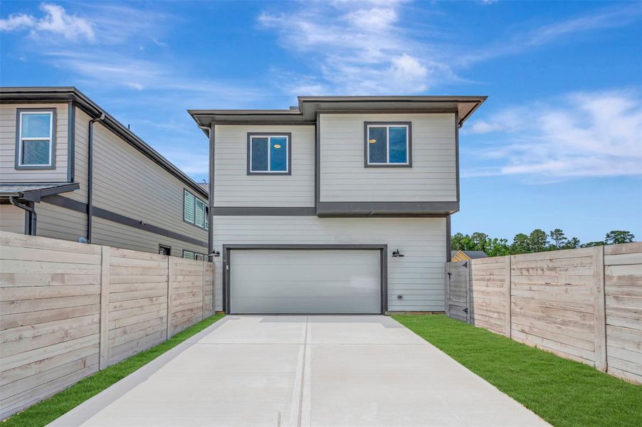 Front exterior of a new home in , Montgomery, TX, highlighting curb appeal (Image 26). Front exterior of a new home in , Montgomery, TX, highlighting curb appeal (Image 26).