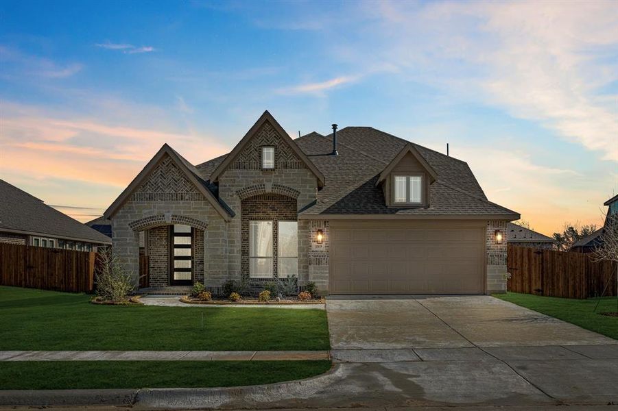 Front exterior of a new home in Sable Creek, Sanger, TX, highlighting curb appeal (Image 1).