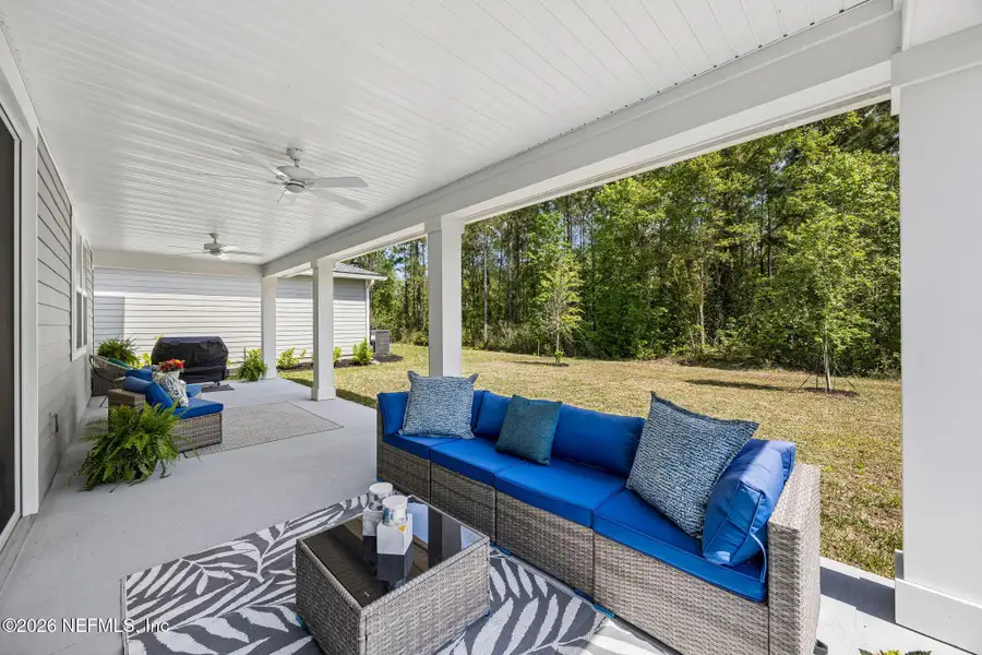 Exterior details and patio area of a home in Tributary, Yulee (Image 22).